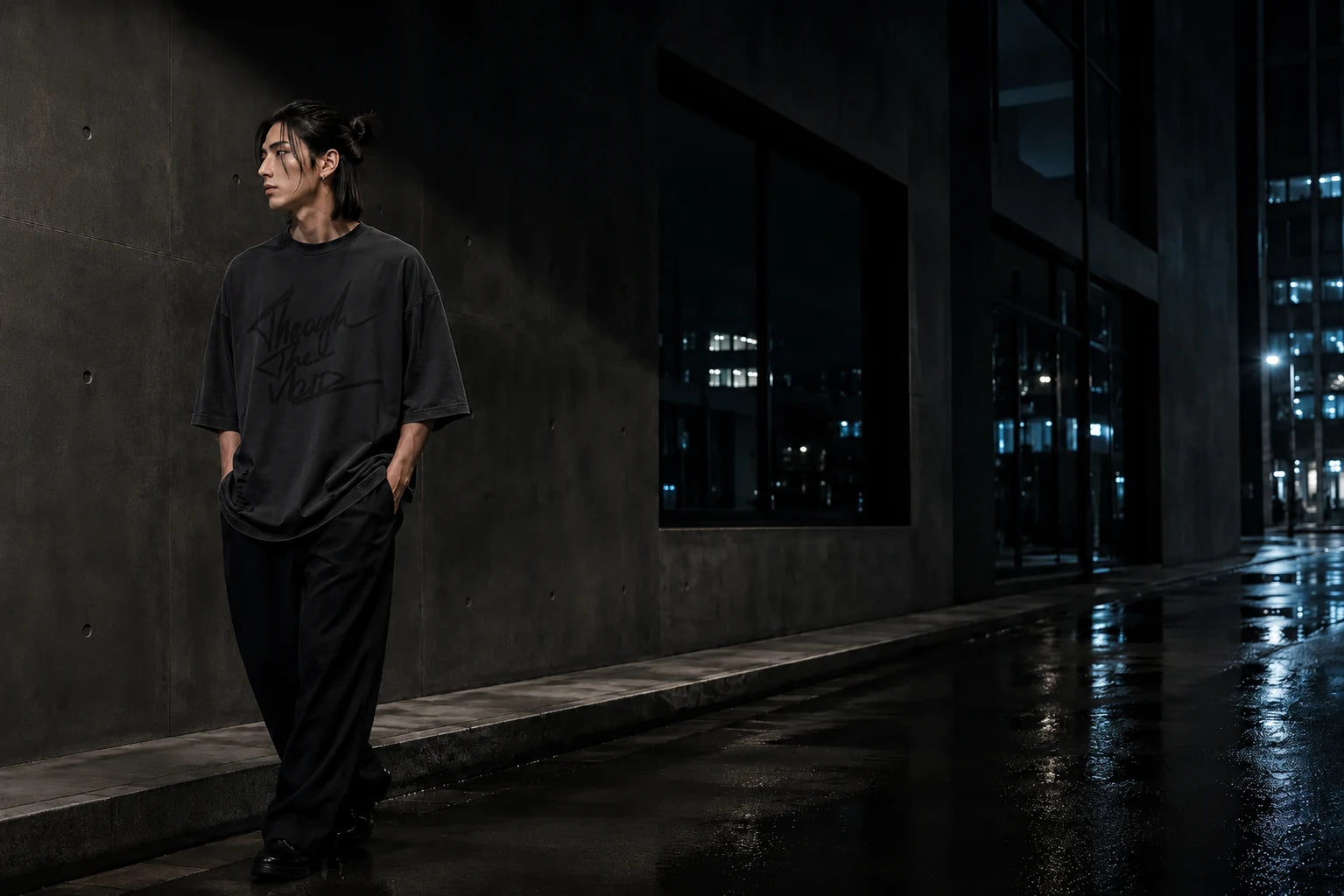 Washed black AFTERFORM VOID Washed Raw-Hem T-Shirt in a rain-darkened night setting.
