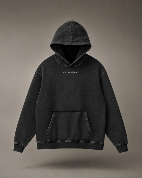 Front view of AFTERFORM NULL Washed Loose Cotton Hoodie in washed black